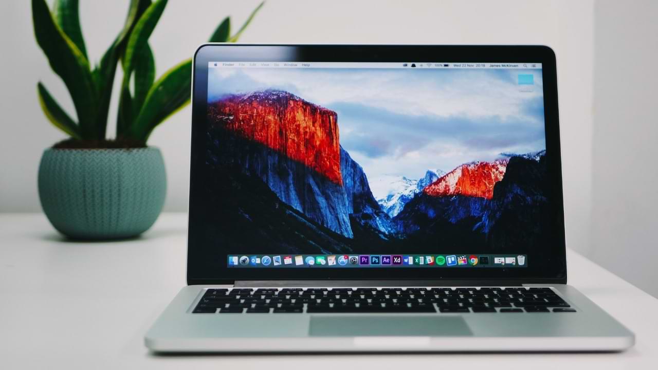 A photo of a Mac on a table