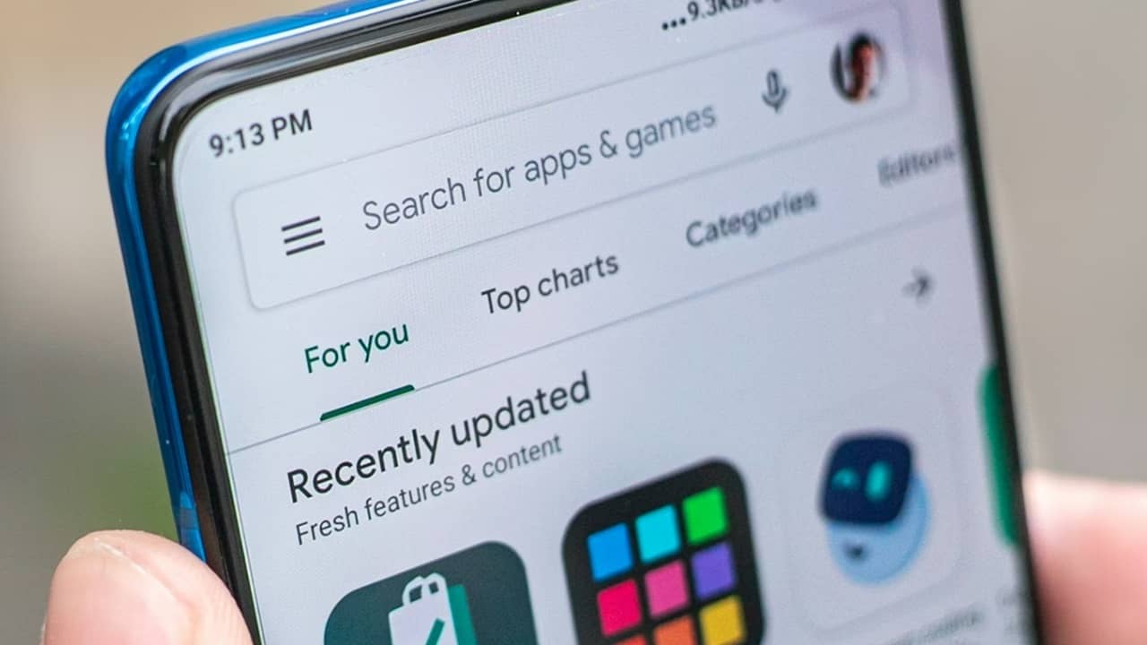 Android phone with Google Play Store home page.